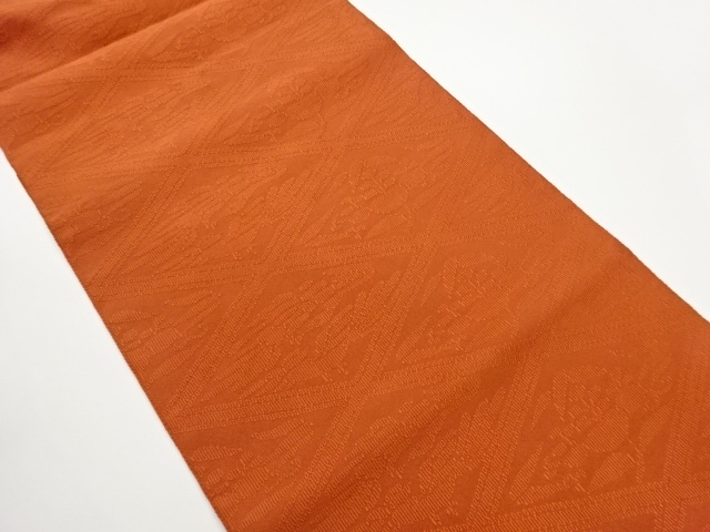 綴れ菱に抽象花葉模様織出し名古屋帯